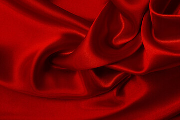 Dark red fabric texture background, detail of silk or linen pattern.