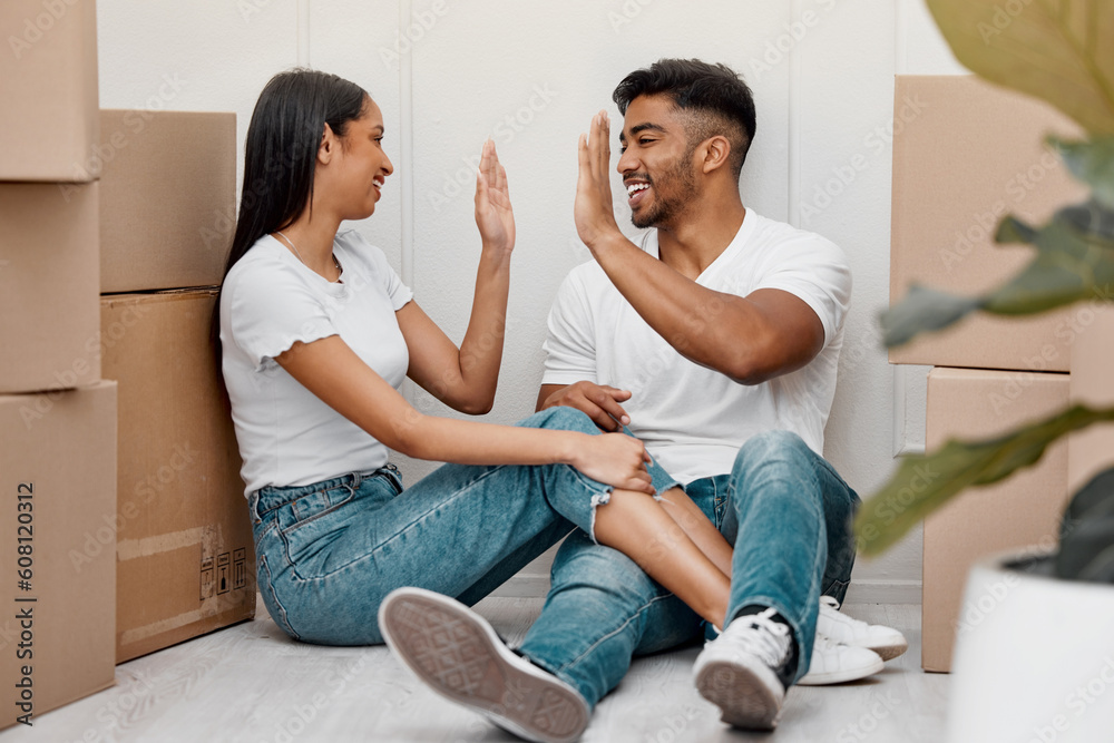 Canvas Prints Box, celebration and couple high five in new home excited for property, apartment and real estate investment, Relationship, house and man and woman celebrate with smile, boxes and happy on moving day