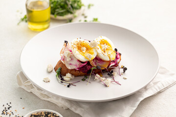 Gourmet bruschetta toast with egg and vegetables