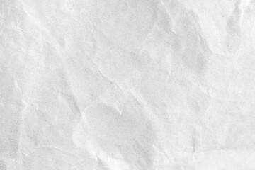 Wrinkled white paper as a background or wallpaper
