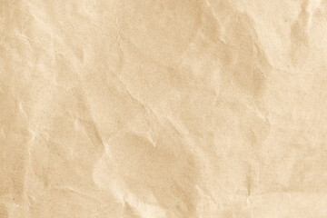 Wrinkled yellow paper as a background or wallpaper