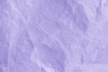 Wrinkled purple paper as a background or wallpaper