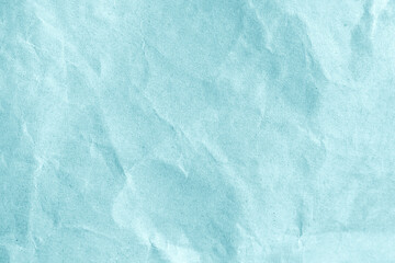 Obraz premium Wrinkled light blue paper as a background or wallpaper