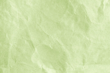Wrinkled green paper as a background or wallpaper
