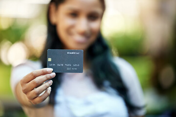 Woman, outdoor and credit card for payment, retail or banking with transaction, shopping or client. Portrait, female person or customer with ecommerce, budget or savings with luxury, discount or sale