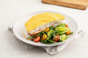 Portion of gourmet french airy poulard omelette breakfast