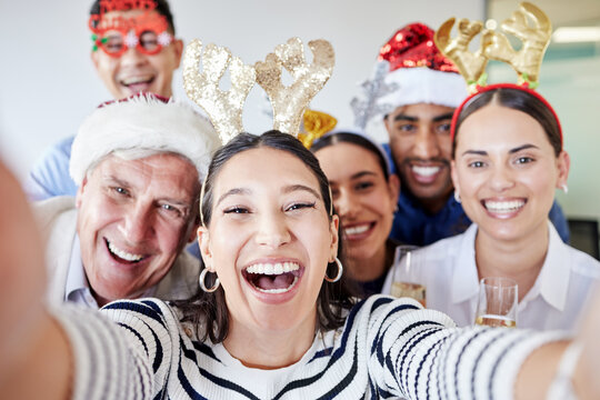Selfie, Christmas and portrait of happy business people in office for party, holiday celebration and event. Company, festive and excited men and women take picture for social media, update and memory