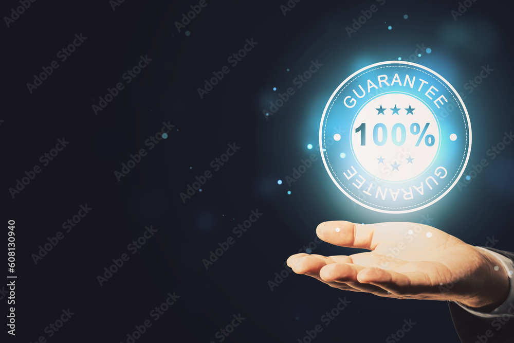 Poster close up of man hand holding glowing 100% guarantee stamp hologram on dark background with bokeh cir