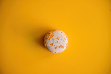 Crunchy Almond Brittle Macaroon on Vibrant Yellow Background