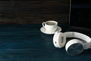 Concept of freelance, composition with hot drink and headphones