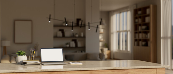 A laptop computer mockup on a table in modern contemporary living room.