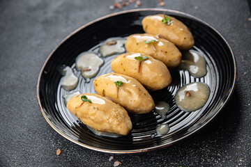 quenelles meat mushroom sauce healthy meal food snack on the table copy space food background rustic top view