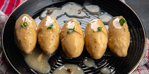 quenelles meat mushroom sauce healthy meal food snack on the table copy space food background rustic top view
