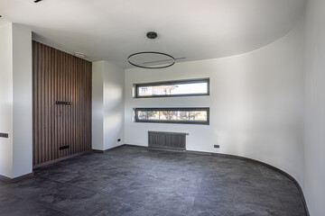 empty room without furniture with rounded corner