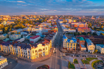 Fototapeta na wymiar Panorama city Tomsk and Tom River with sunlight. Aerial top view