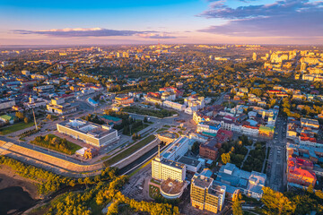 Panorama city Tomsk and Tom River with sunlight. Aerial top view