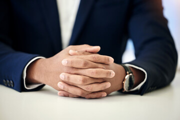 Obraz premium Interview, ready and hands of a businessman at work for a corporate job, recruitment or hr meeting. Professional, closeup and an employee sitting at a table with patience, waiting or working