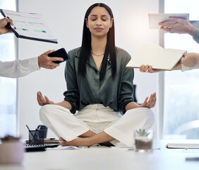 Meditation, woman at desk surrounded by work and relax with project deadline, time management and mental health. Zen, peace and meditate for balance, businesswoman in busy office in lotus position. - obrazy, fototapety, plakaty