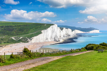 Panoramic view of the Seven Sisters Chalk cliffs during an early summer day, Seaford, East Sussex,...