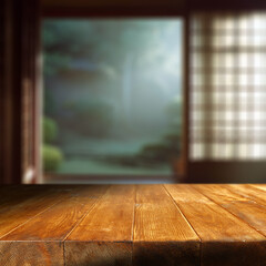Desk of free space and blurred japan interior with window  - 608156591