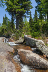 Fototapeta na wymiar Stream and rocks in the Mountain Shoria. Russia