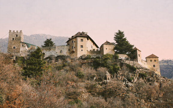 JUVAL CASTLE, NATURNS, KASTELBELL-TSCHARS, SOUTH TYROL, ITALY - MARCH 19, 2023: Juval Castle above the village of Naturns in South Tyrol. Juval Castle is a venue of the Messner Mountain Museum.