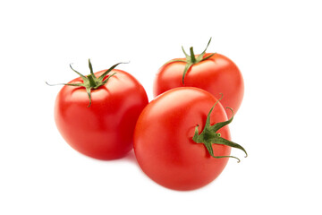 Delicious red tomatoes isolated on white background