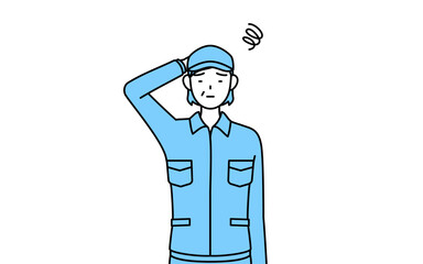 困って頭をかく帽子と作業着姿のシニア女性（経営者、管理職、上司）