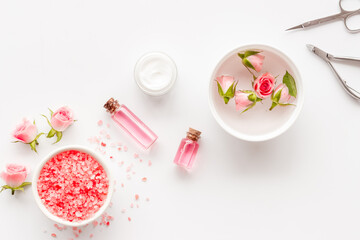Manicure accessories with pink roses flowers. Beauty care salon spa.