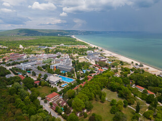 An aerial view unveils the charming city of Kranevo in Bulgaria. The azure coastline, adorned with...