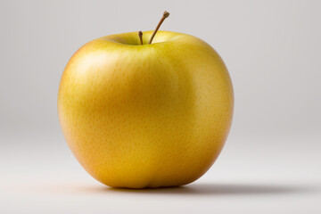 Yellow apple with leaf on a white background. The concept of healthy eating.created with generative AI