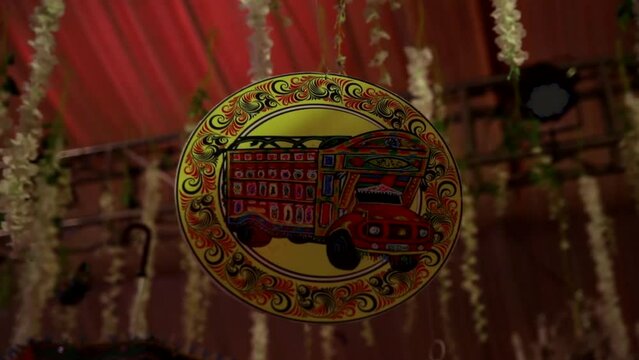 Truck Art Hangings on a Themed Mehndi Dance Floor with flashing lights