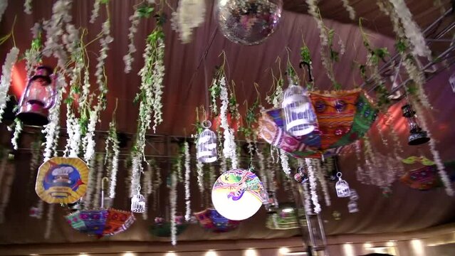 Umbrella Hangings on a Dance Floor with flashing lights