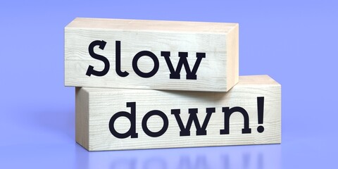 Slow down - words on wooden blocks - 3D illustration