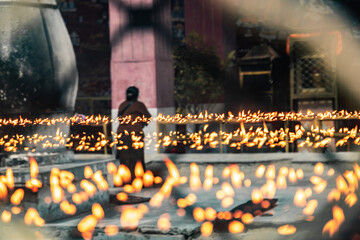 burning candles in the temple