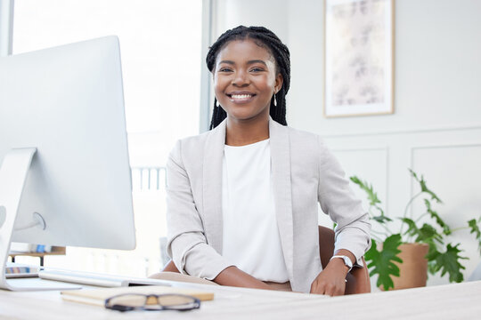 Business, smile and portrait of black woman at desk for corporate career, pride or happiness. Face of professional african female entrepreneur or CEO with success mindset, development and growth