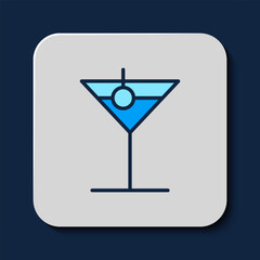 Filled outline Martini glass icon isolated on blue background. Cocktail icon. Wine glass icon. Vector