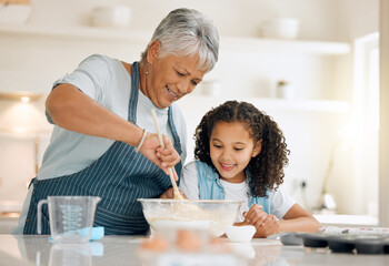 Grandmother, cooking or child baking in kitchen as a happy family with young girl learning cookies...