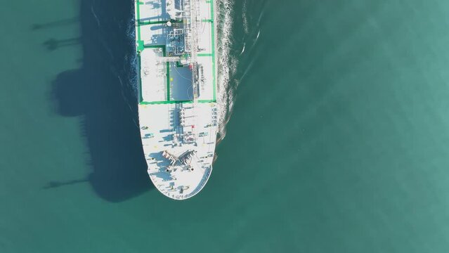 Aerial view of LPG gas ship. Gas carrier, gas tanker sailing in ocean
