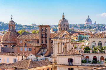 Fototapeta na wymiar Rome cityscape with dome of St. Peter's basilica in Vatican