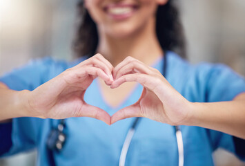 Happy woman, doctor and heart shape hands for love in healthcare or life insurance at the hospital....