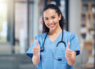 Happy woman, doctor and portrait with thumbs up for winning, success or good job in healthcare at...