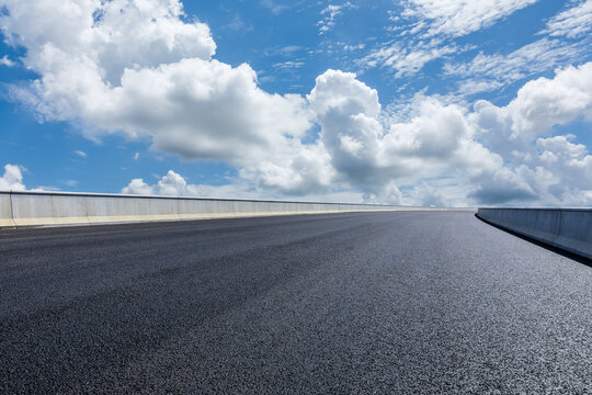 Asphalt highway road and sky cloud background