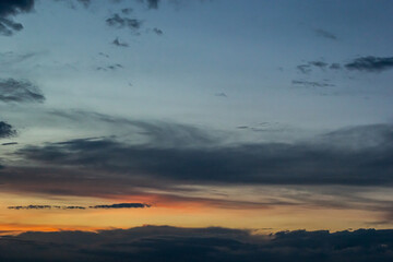 Fototapeta premium sunset sky with multicolor clouds. Dramatic twilight sky background