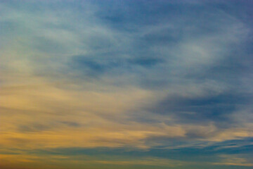 sunset sky with multicolor clouds. Dramatic twilight sky background