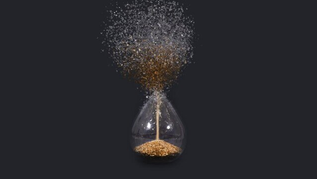 Hourglass disintegrates into pieces on a black background