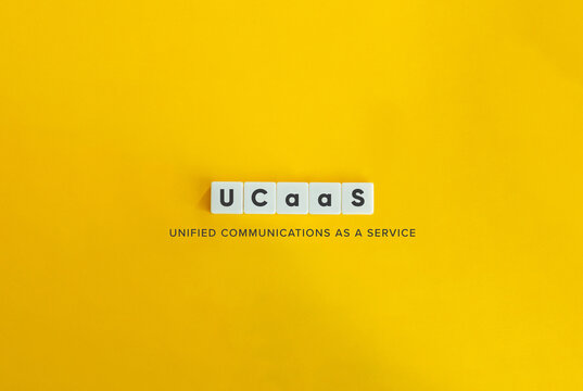 UCaaS acronym (Unified Communications as a Service). Block Letter Tiles on Yellow Background. Minimal Aesthetic.