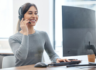 Consultant, woman with headset and on a computer at her desk in a workplace office. Telemarketing...