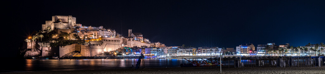 Beautifull Night view of Peñiscola village castle from the beach