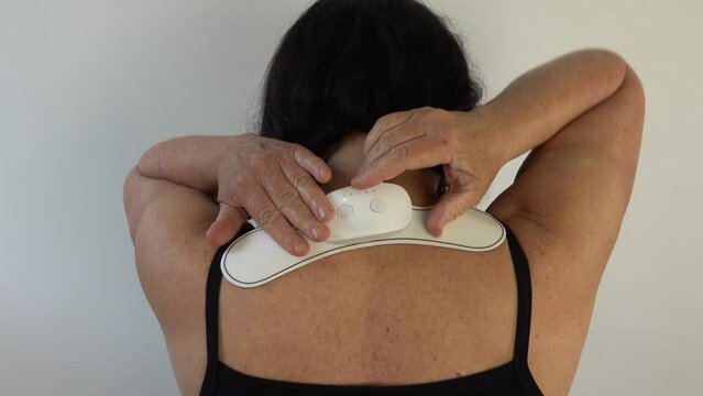 shoulder and cervical electrostimulation device on the back of neck